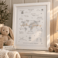 Personalised world map birth print with child's name and details in a white frame.