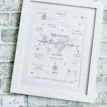 Personalised baby birth print with map and name in a white frame.