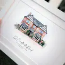 Watercolour house portrait in a white frame, custom art by Artiecrafts by Lucy.
