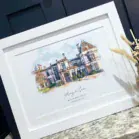 Watercolor painting of a historic hotel with elegant architecture and lush surroundings.